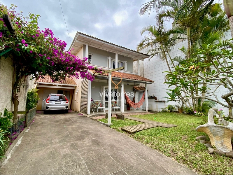 Casa com 4 dormitórios sendo 1 suíte situada na Praia da Cal: 3ª foto da galeria de imagens do imóvel