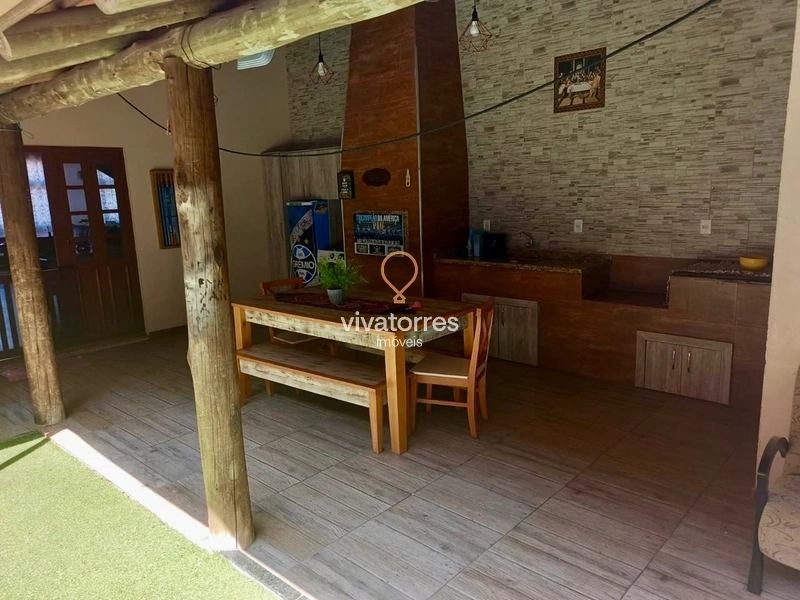 Casa de 3 dormitórios com suíte e piscina em Torres: 3ª foto da galeria de imagens do imóvel