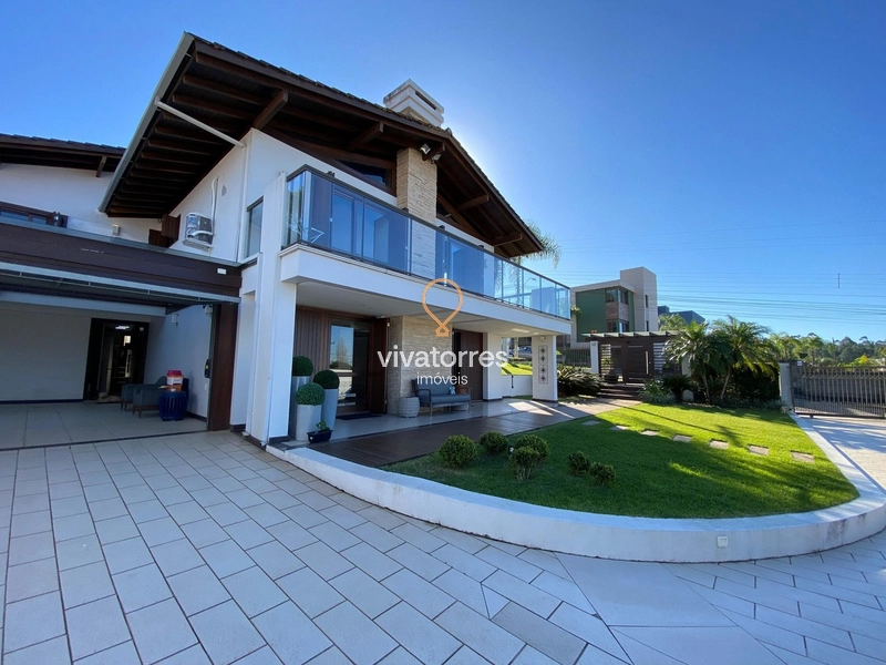 Casa de 4 dormitórios com suíte master à venda em Torres: 3ª foto da galeria de imagens do imóvel