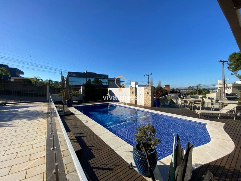 Casa de 4 dormitórios com suíte master à venda em Torres: 2ª foto da galeria de imagens do imóvel