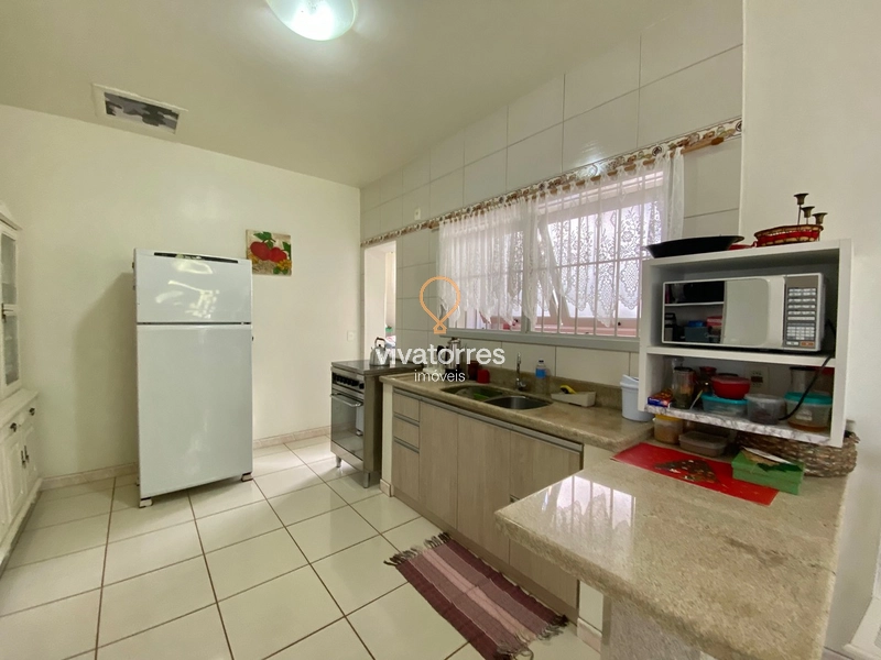 Casa a 2 quadras da praia em Torres: 11ª foto da galeria de imagens do imóvel