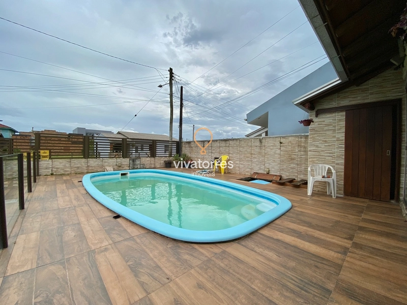 Casa de 4 dormitórios com suíte e piscina: 5ª foto da galeria de imagens do imóvel