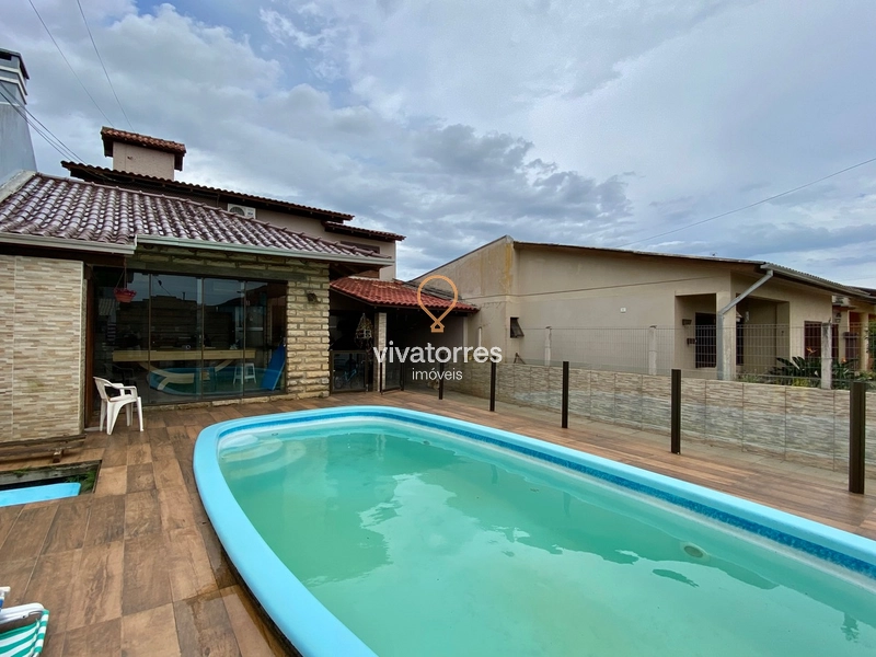 Casa de 4 dormitórios com suíte e piscina: 6ª foto da galeria de imagens do imóvel