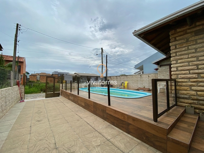 Casa de 4 dormitórios com suíte e piscina: 4ª foto da galeria de imagens do imóvel