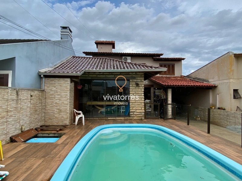 Casa de 4 dormitórios com suíte e piscina: 7ª foto da galeria de imagens do imóvel