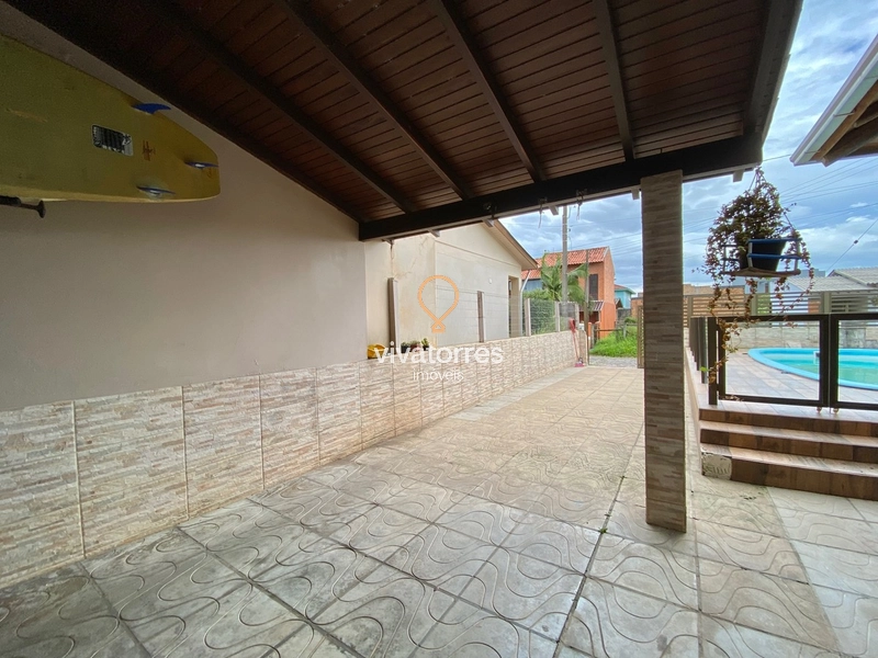 Casa de 4 dormitórios com suíte e piscina: 3ª foto da galeria de imagens do imóvel