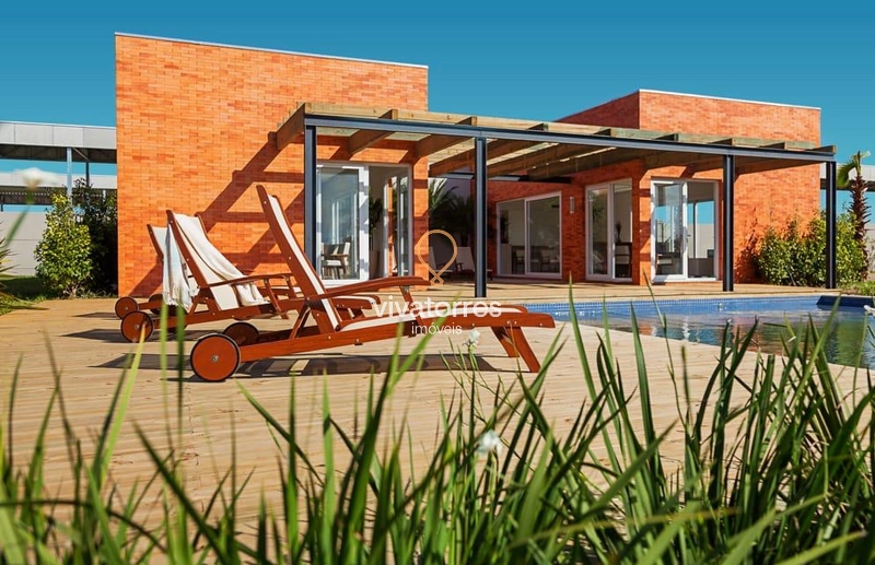 Lote com fundos lago em condomínio fechado de Torres: 4ª foto da galeria de imagens do imóvel