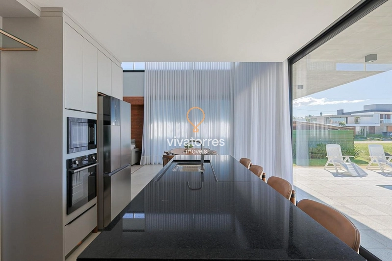 Casa em condomínio -Torres RS-: 5ª foto da galeria de imagens do imóvel