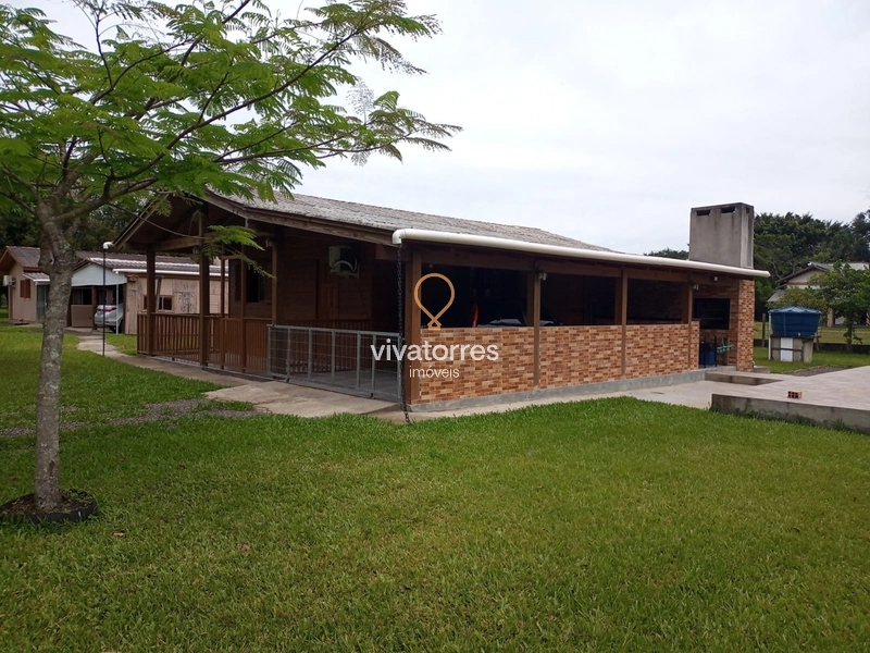 Terro com 2 casa e piscina -Torres Rs-: 1ª foto da galeria de imagens do imóvel