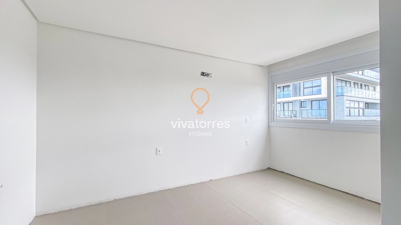 Apartamento 2 dormitórios sendo 1 suíte em região nobre de Torres/RS: 4ª foto da galeria de imagens do imóvel