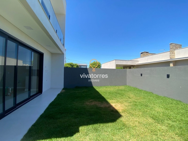 Casa com 3 Dormitórios (sendo 01 suíte) Morada das Palmeiras - Torres-: 8ª foto da galeria de imagens do imóvel