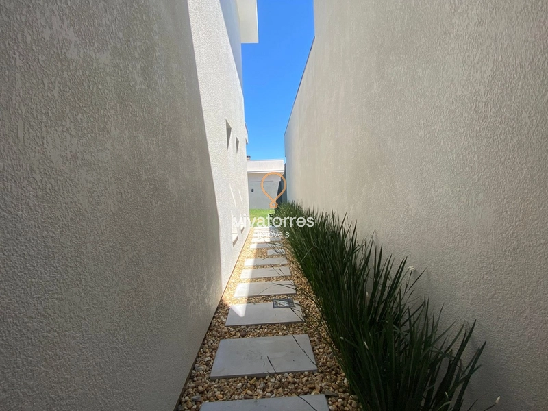 Casa com 3 Dormitórios (sendo 01 suíte) Morada das Palmeiras - Torres-: 10ª foto da galeria de imagens do imóvel