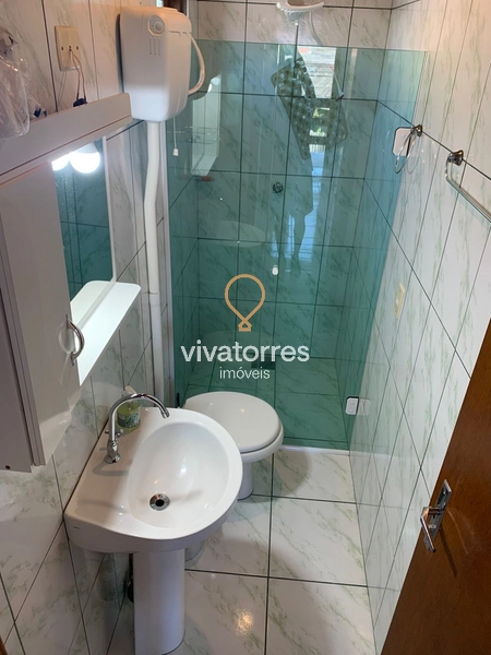 Casa com 03 dormitórios -Torres RS-: 12ª foto da galeria de imagens do imóvel