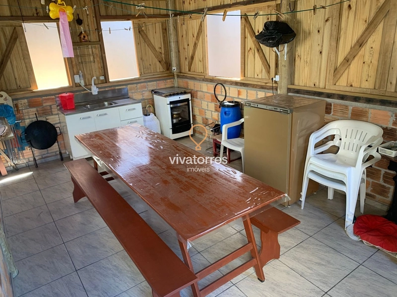 Casa com 03 dormitórios -Torres RS-: 10ª foto da galeria de imagens do imóvel