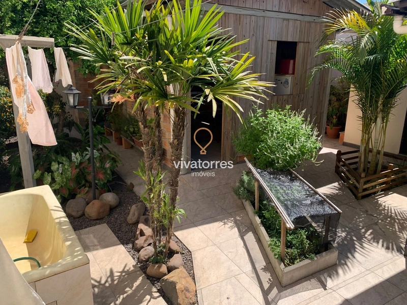 Casa com 03 dormitórios -Torres RS-: 9ª foto da galeria de imagens do imóvel