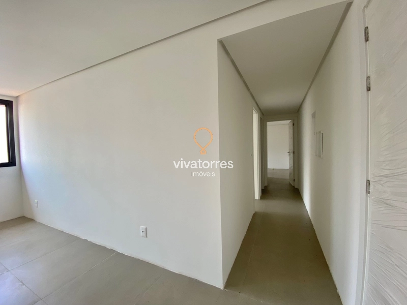 Apartamento de 2 dormitórios com suíte próximo do mar em Torres: 10ª foto da galeria de imagens do imóvel