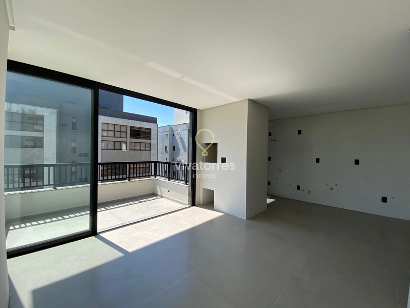 Apartamento 2 dormitórios com suíte à venda em Torres: 2ª foto da galeria de imagens do imóvel