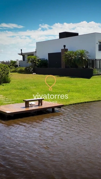 Lote fundos lago em condomínio: 1ª foto da galeria de imagens do imóvel