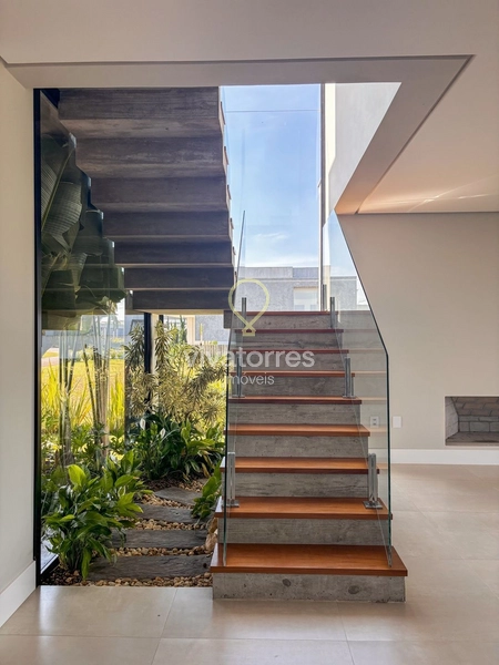 Casa de alto padrão com 4 suítes em condomínio fechado de Torres: 4ª foto da galeria de imagens do imóvel