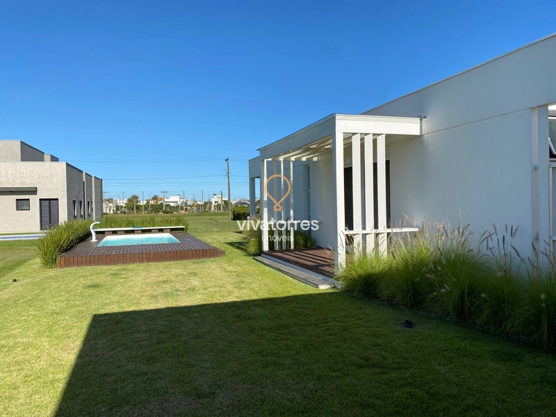 Casa com 3 suítes à venda em condomínio fechado de Torres: 33ª foto da galeria de imagens do imóvel