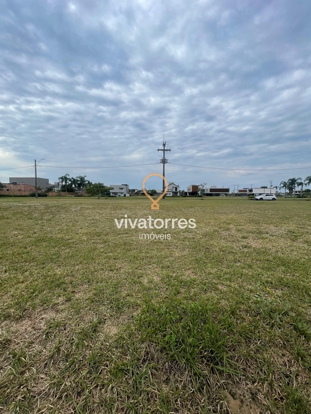 Lote fundos lago em condomínio fechado de Torres: 5ª foto da galeria de imagens do imóvel