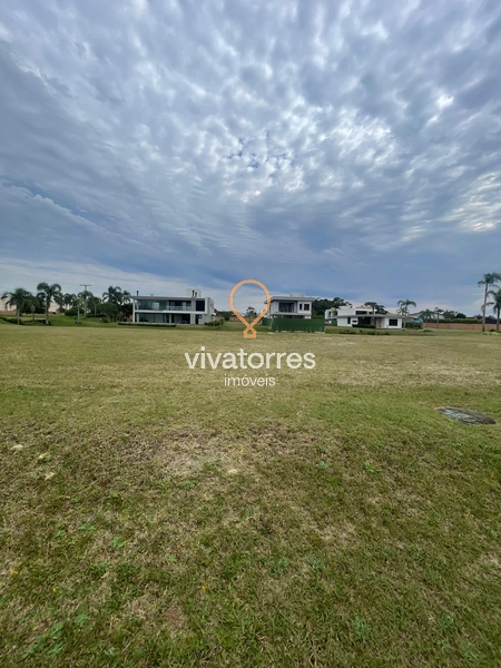 Lote fundos lago em condomínio fechado de Torres: 4ª foto da galeria de imagens do imóvel