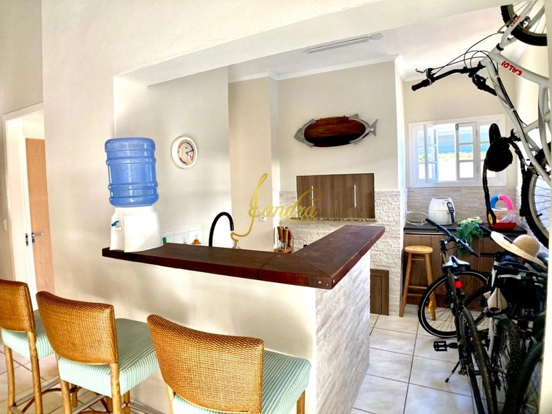 Casa em Atlântida perto mar, com 04 dormitórios e piscina: 2ª foto da galeria de imagens do imóvel