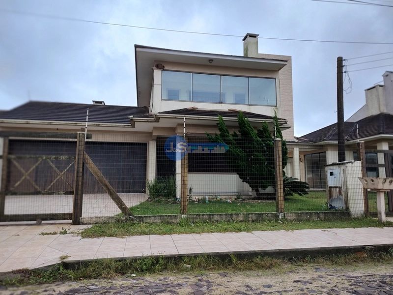Excelente casa em Atlântida Sul: 1ª foto da galeria de imagens do imóvel