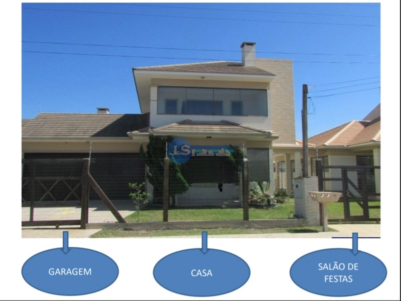 Excelente casa em Atlântida Sul: 2ª foto da galeria de imagens do imóvel