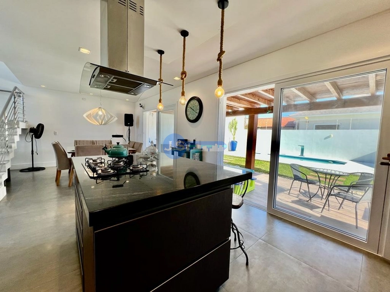 Excelente casa em Atlântida Sul: 3ª foto da galeria de imagens do imóvel