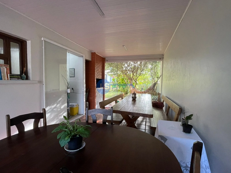 Casa em Atlântida Sul: 5ª foto da galeria de imagens do imóvel