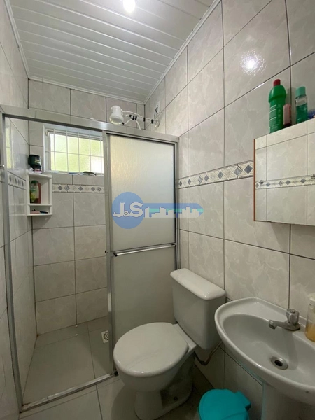 Casa em Atlântida Sul: 4ª foto da galeria de imagens do imóvel