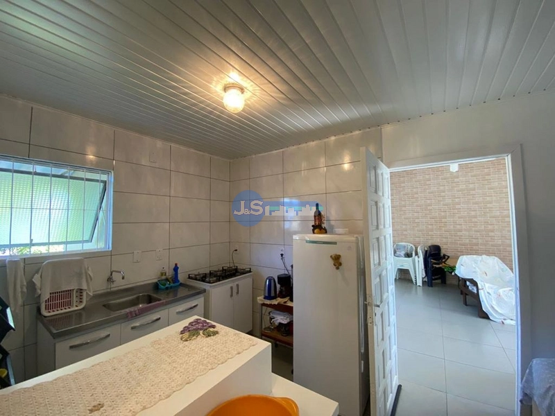 Casa em Atlântida Sul: 3ª foto da galeria de imagens do imóvel