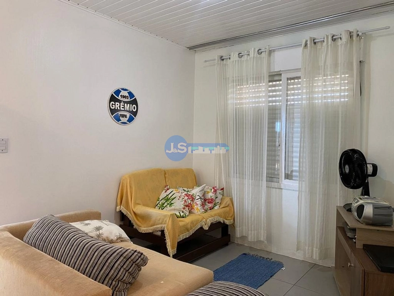 Casa em Atlântida Sul: 2ª foto da galeria de imagens do imóvel