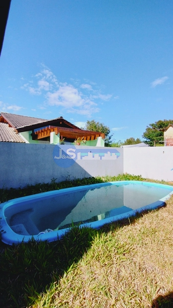 CASA DE PRAIA COM PISCINA: 3ª foto da galeria de imagens do imóvel