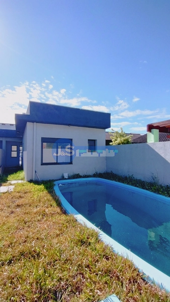 CASA DE PRAIA COM PISCINA: 2ª foto da galeria de imagens do imóvel