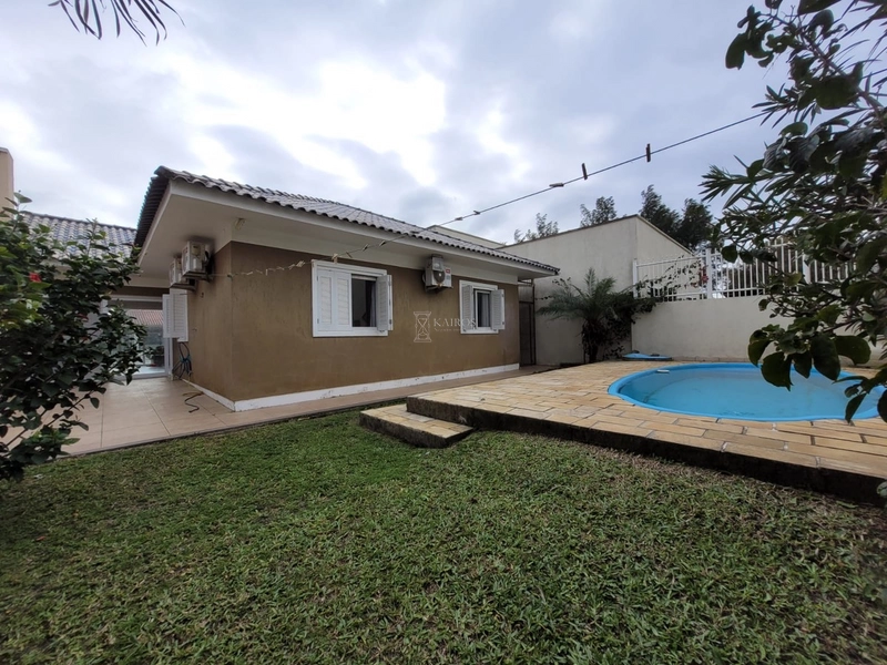EXCELENTE CASA COM PISCINA: 4ª foto da galeria de imagens do imóvel