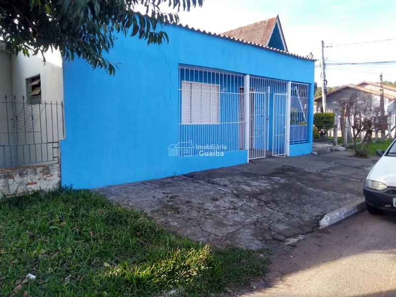 Terreno de esquina com casas: 3ª foto da galeria de imagens do imóvel