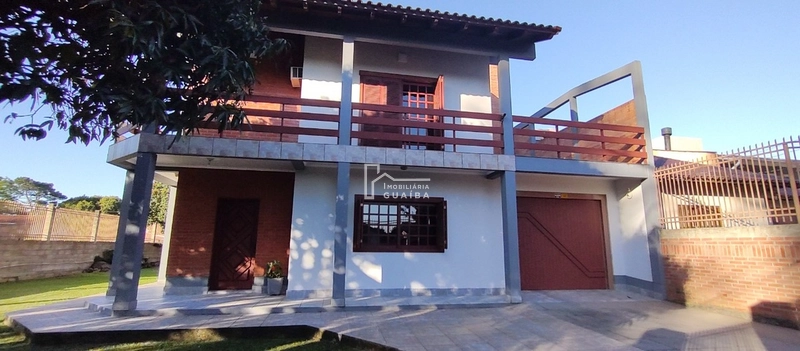 Bela casa com piscina!: 2ª foto da galeria de imagens do imóvel