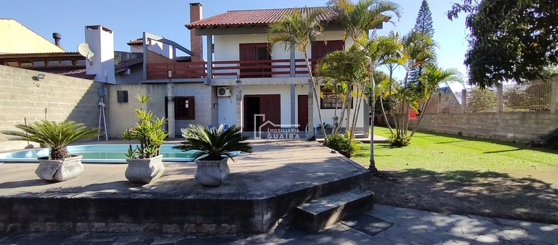 Bela casa com piscina!: 12ª foto da galeria de imagens do imóvel