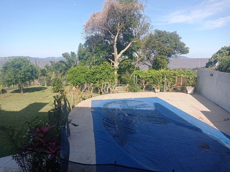 Casa alto padrão com vista espetacular para o Guaíba!: 31ª foto da galeria de imagens do imóvel