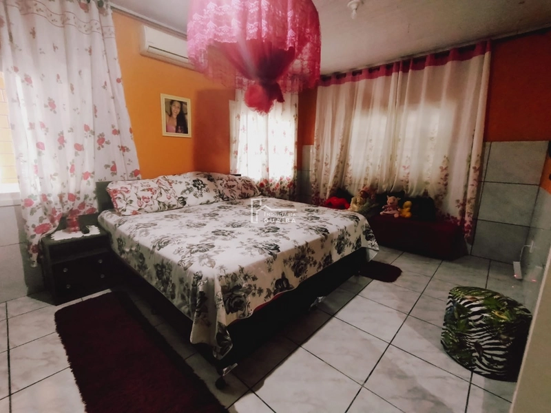 Casa 3 dormitórios: 15ª foto da galeria de imagens do imóvel