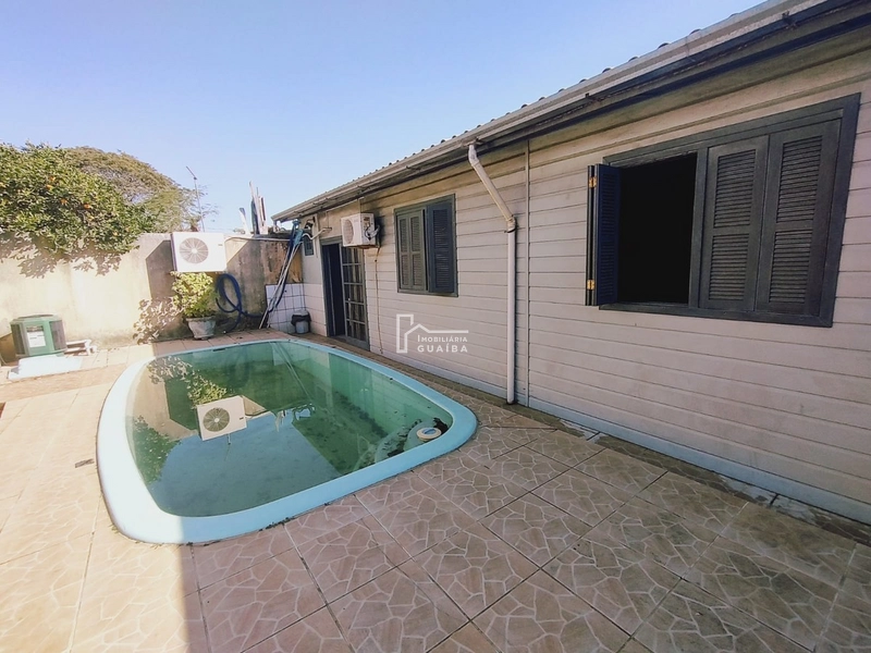 Casa de 3 dormitórios com piscina: 21ª foto da galeria de imagens do imóvel