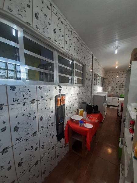 Casa na avenida principal do bairro Santa Rita: 27ª foto da galeria de imagens do imóvel