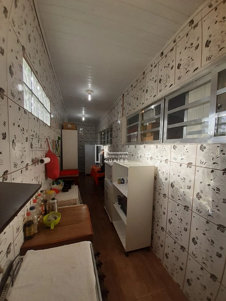 Casa na avenida principal do bairro Santa Rita: 15ª foto da galeria de imagens do imóvel