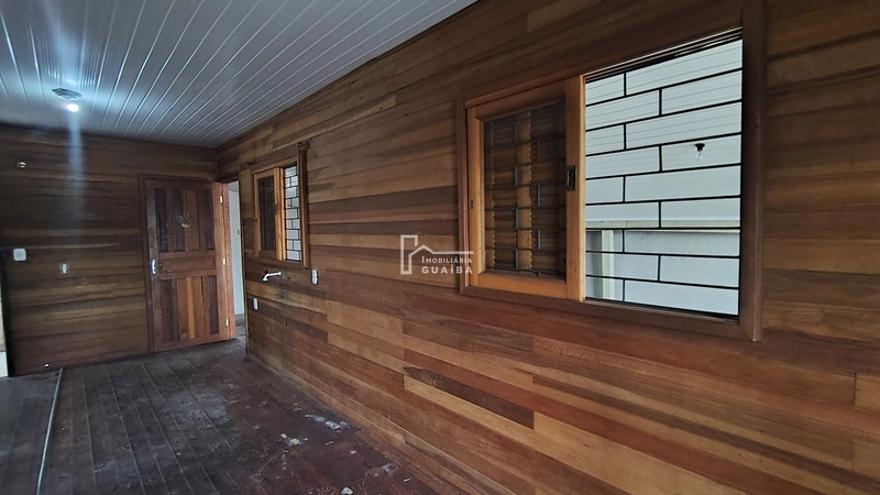 Bela casa de madeira á venda no bairro Jardim dos Lagos -Guaíba -RS: 27ª foto da galeria de imagens do imóvel