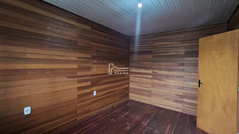 Bela casa de madeira á venda no bairro Jardim dos Lagos -Guaíba -RS