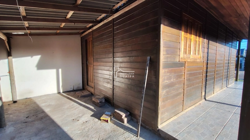 Bela casa de madeira á venda no bairro Jardim dos Lagos -Guaíba -RS: 9ª foto da galeria de imagens do imóvel