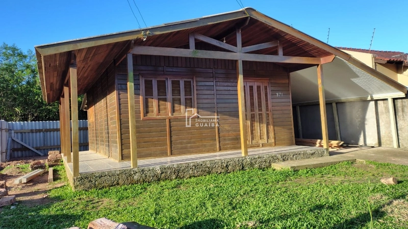 Bela casa de madeira á venda no bairro Jardim dos Lagos -Guaíba -RS: 5ª foto da galeria de imagens do imóvel