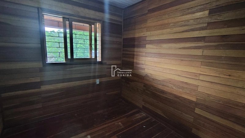 Bela casa de madeira á venda no bairro Jardim dos Lagos -Guaíba -RS: 21ª foto da galeria de imagens do imóvel